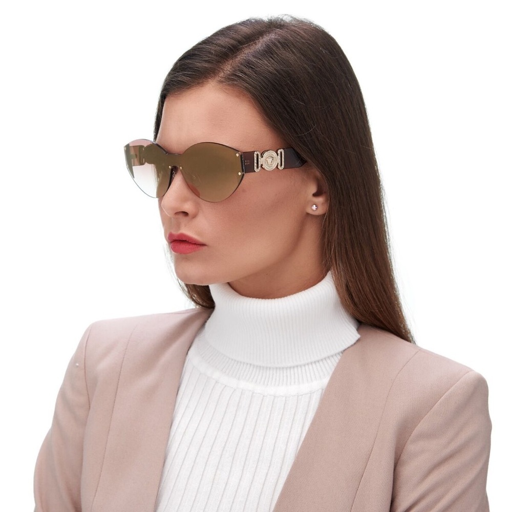 Brown oversized square sunglasses with gradient lenses and thick temple arms